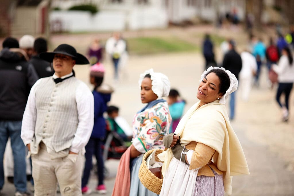 Williamsburg, Va. USA - March 26, 2016: At Colonial Williamsburg you can catch many reenactments of how the people from 18th century lived, in this demonstration they show reenactors demonstrating the slave period during this time.